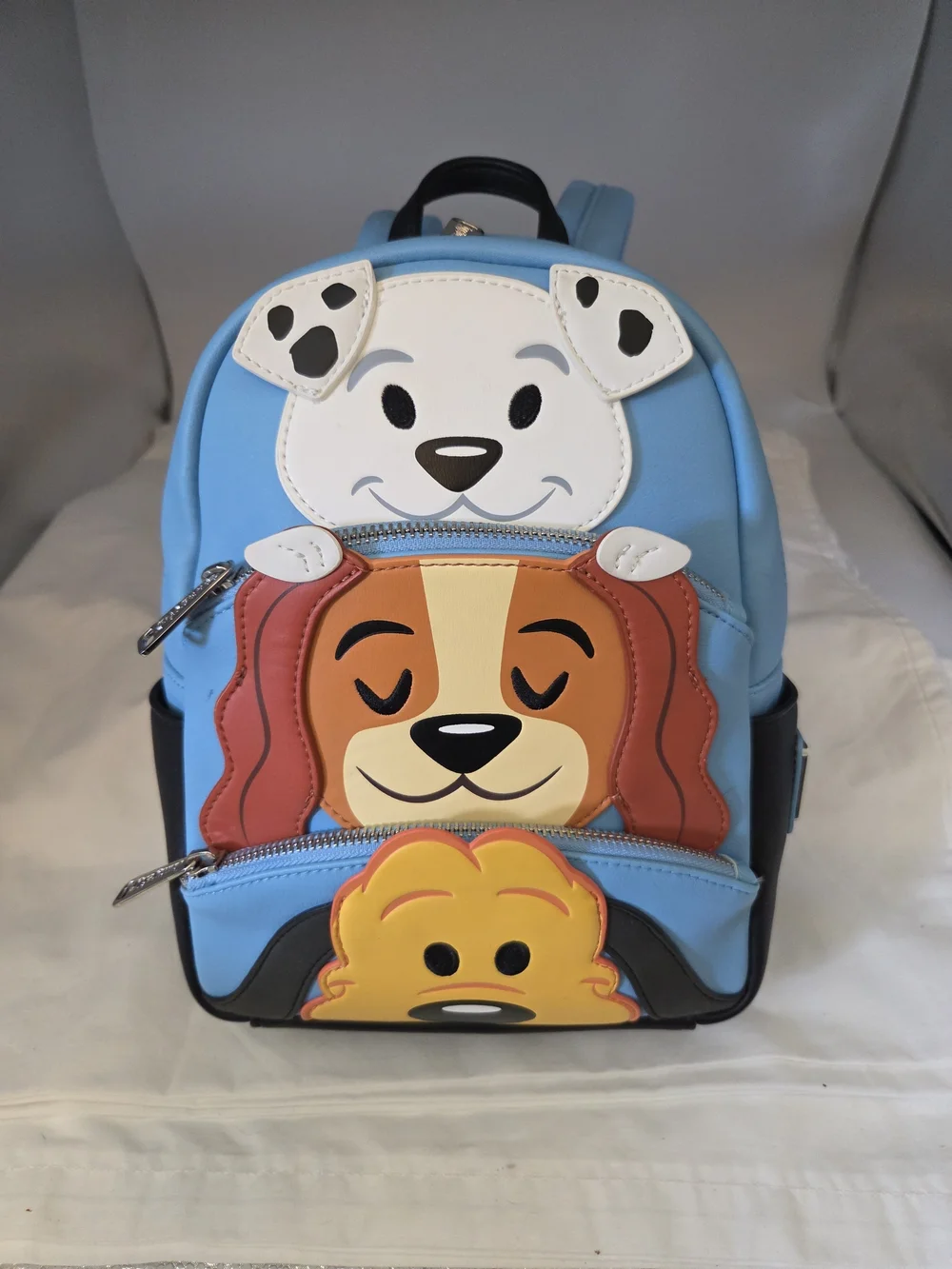 Loungefly Disney Parks Mini Backpack Festuring Rolly, Lady & Pluto